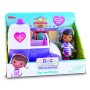 Doctora Juguetes- Dott.ssa Peluche Dottie con Veicolo, 20 x 15 cm, DMH12100